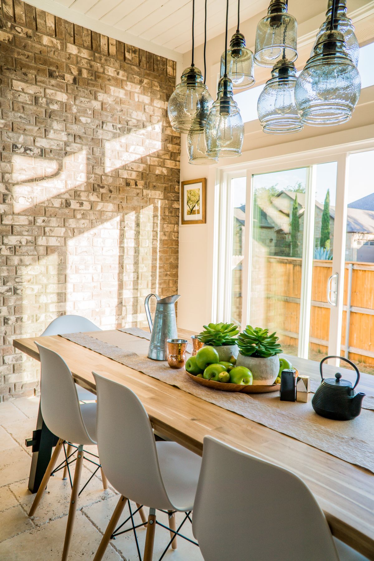 A sunlit dining table with warm, natural detail.